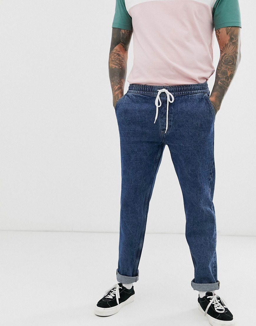 ASOS DESIGN - Jeans regular blu medio piatto con elastico in vita