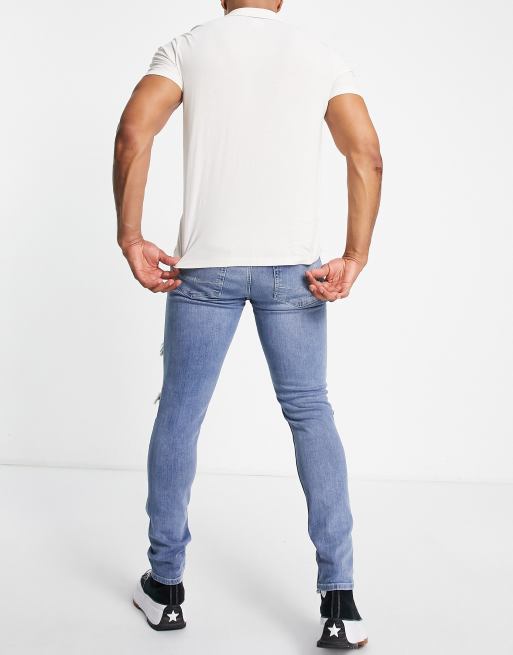 ASOS DESIGN - Jeans skinny blu medio slavato con strappi vistosi , 4 di 4