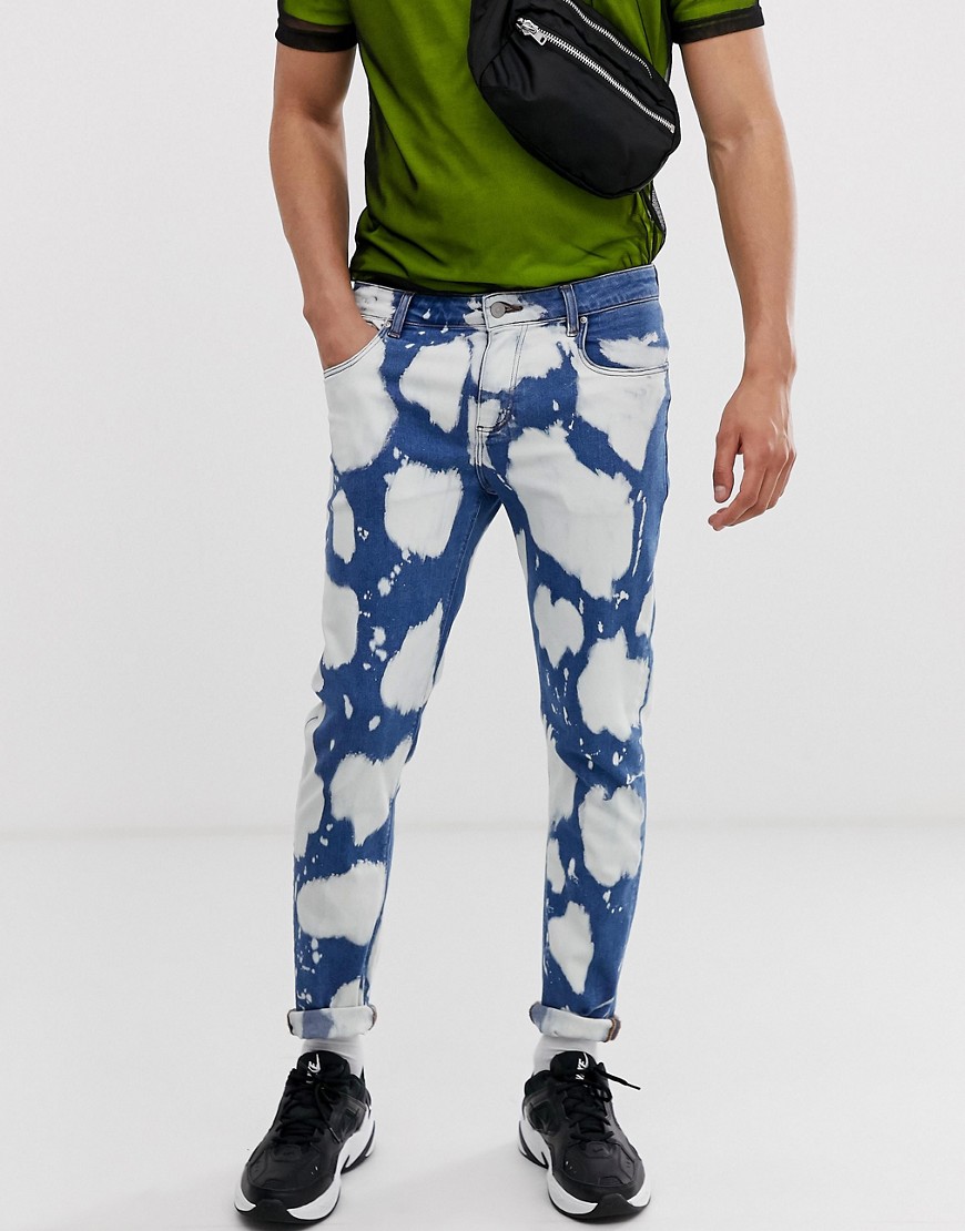 ASOS DESIGN - Jeans skinny con stampa candeggiata-Blu