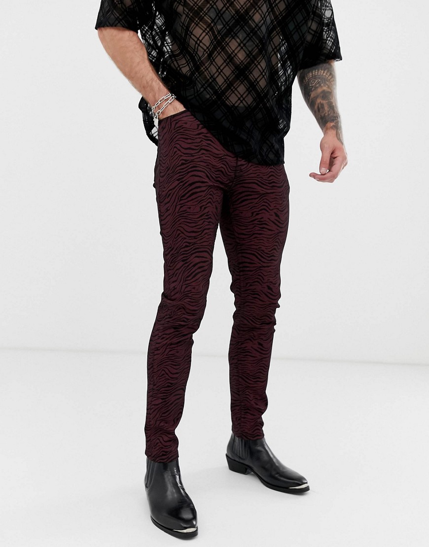 ASOS DESIGN - Jeans skinny con stampa zebrata colorata-Rosso