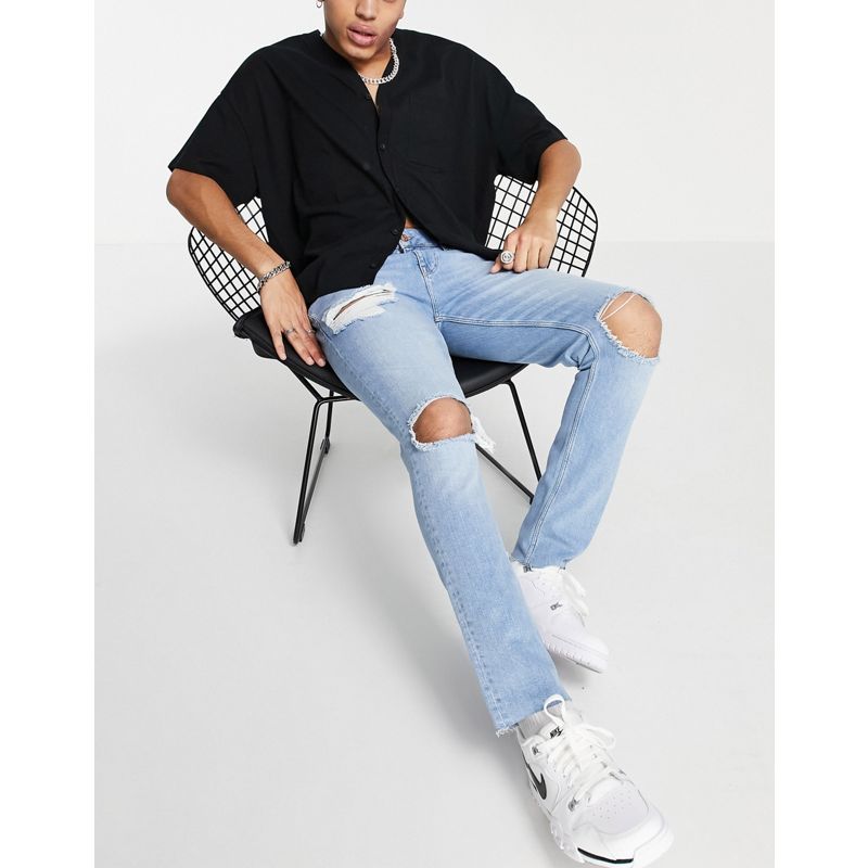 CMUcL Uomo DESIGN - Jeans skinny con strappi vistosi e fondo grezzo, lavaggio blu chiaro