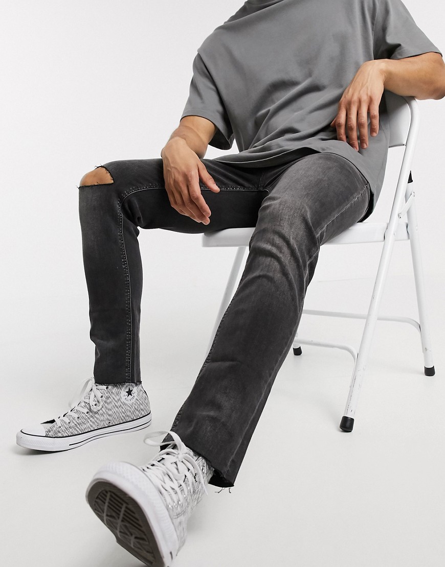 ASOS DESIGN - Jeans skinny corti nero slavato con strappi sulle ginocchia