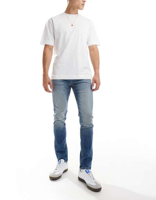 ASOS DESIGN - Jeans skinny lavaggio blu scuro vintage