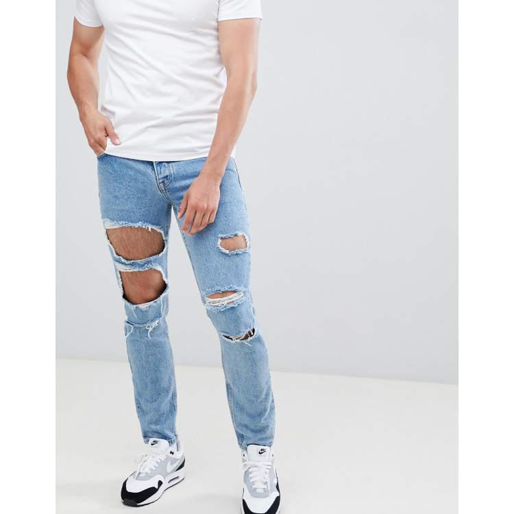 ASOS DESIGN Jeans slim blu lavaggio medio molto strappati ASOS