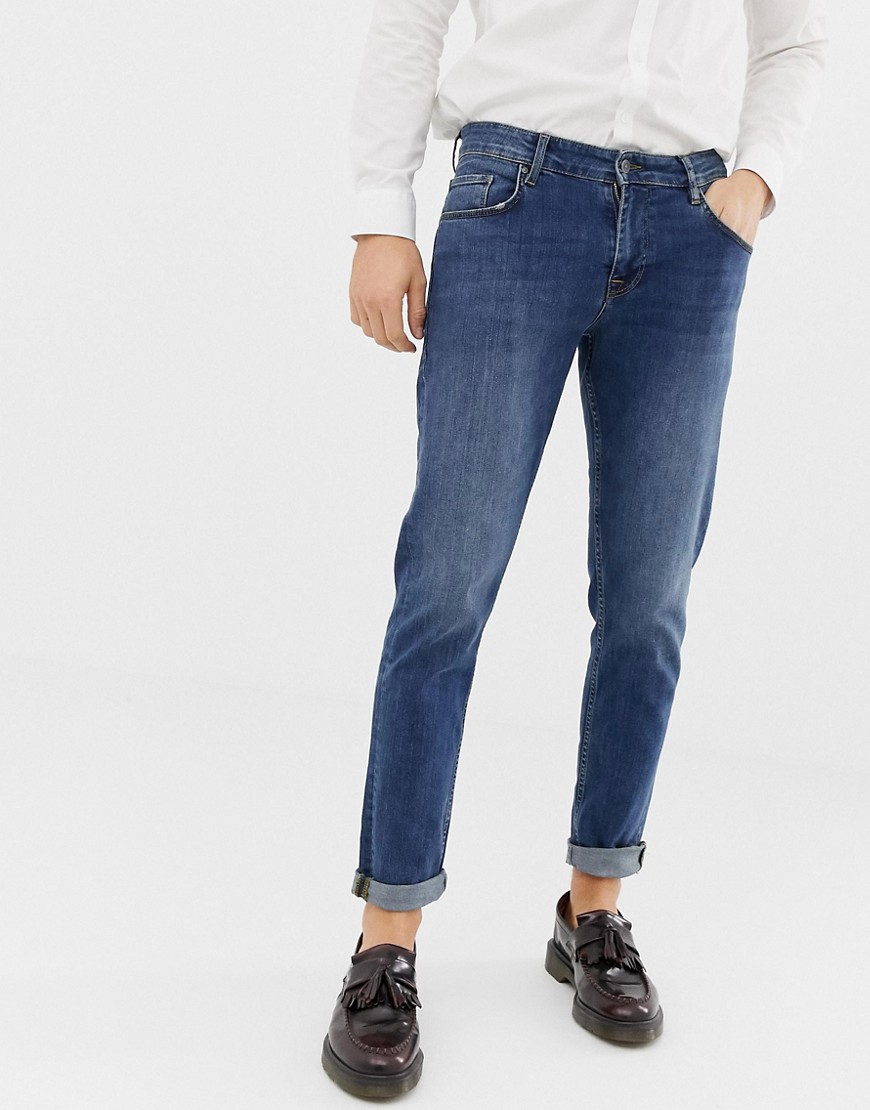 ASOS DESIGN - Jeans slim elasticizzati lavaggio medio-Blu