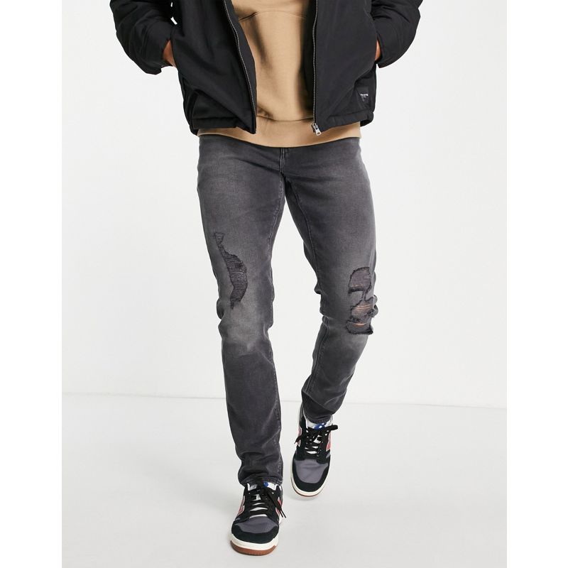 Uomo Jeans DESIGN - Jeans slim elasticizzati nero slavato con strappi sulle ginocchia