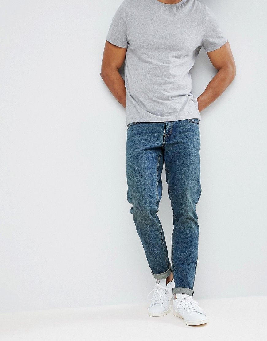 ASOS DESIGN - Jeans slim lavaggio blu scuro vintage