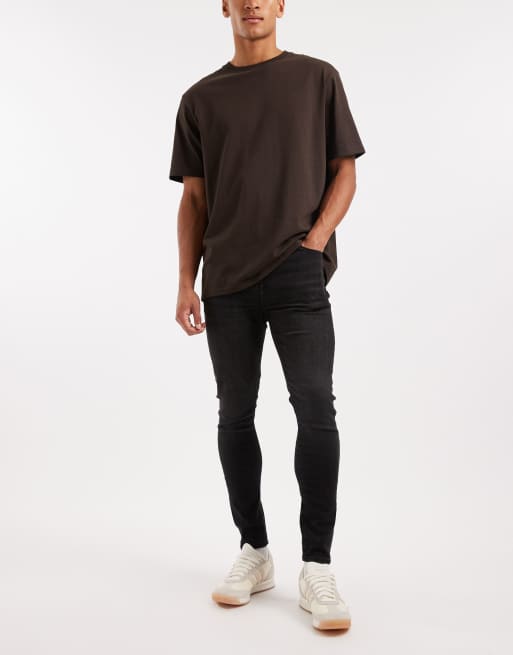 ASOS DESIGN - Jeans spray on neri in denim power stretch