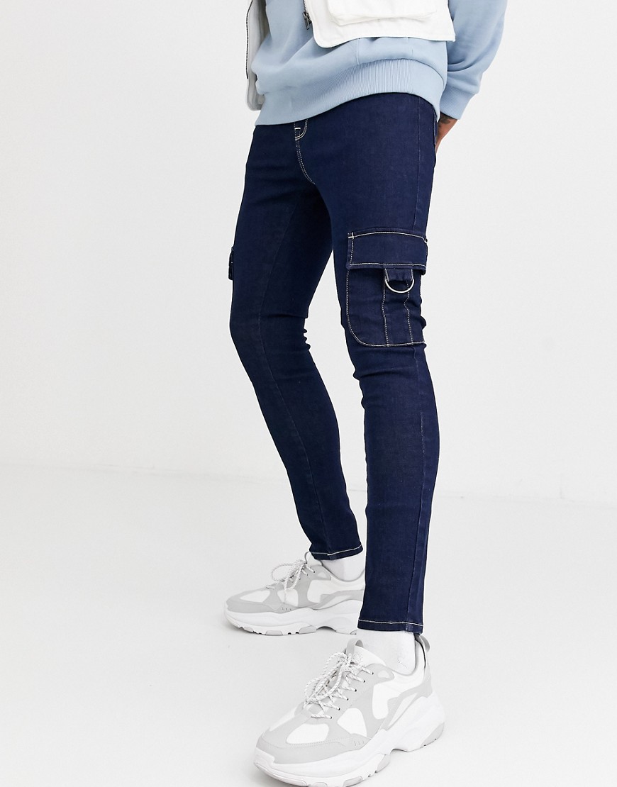 ASOS DESIGN - Jeans spray on power stretch con tasche cargo blu grezzo
