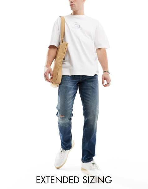 ASOS DESIGN - Jeans stretch slim blu scuro con strappi sulle ginocchia - view 1