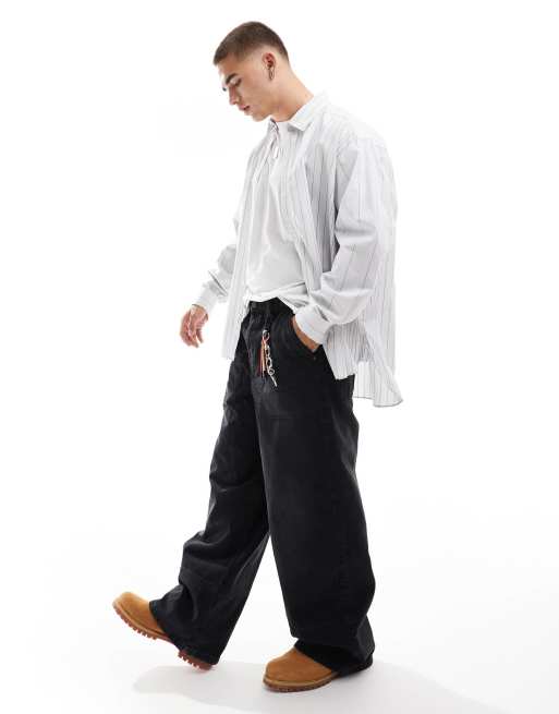 ASOS DESIGN - Jeans super ampi nero slavato con dettagli carpenter