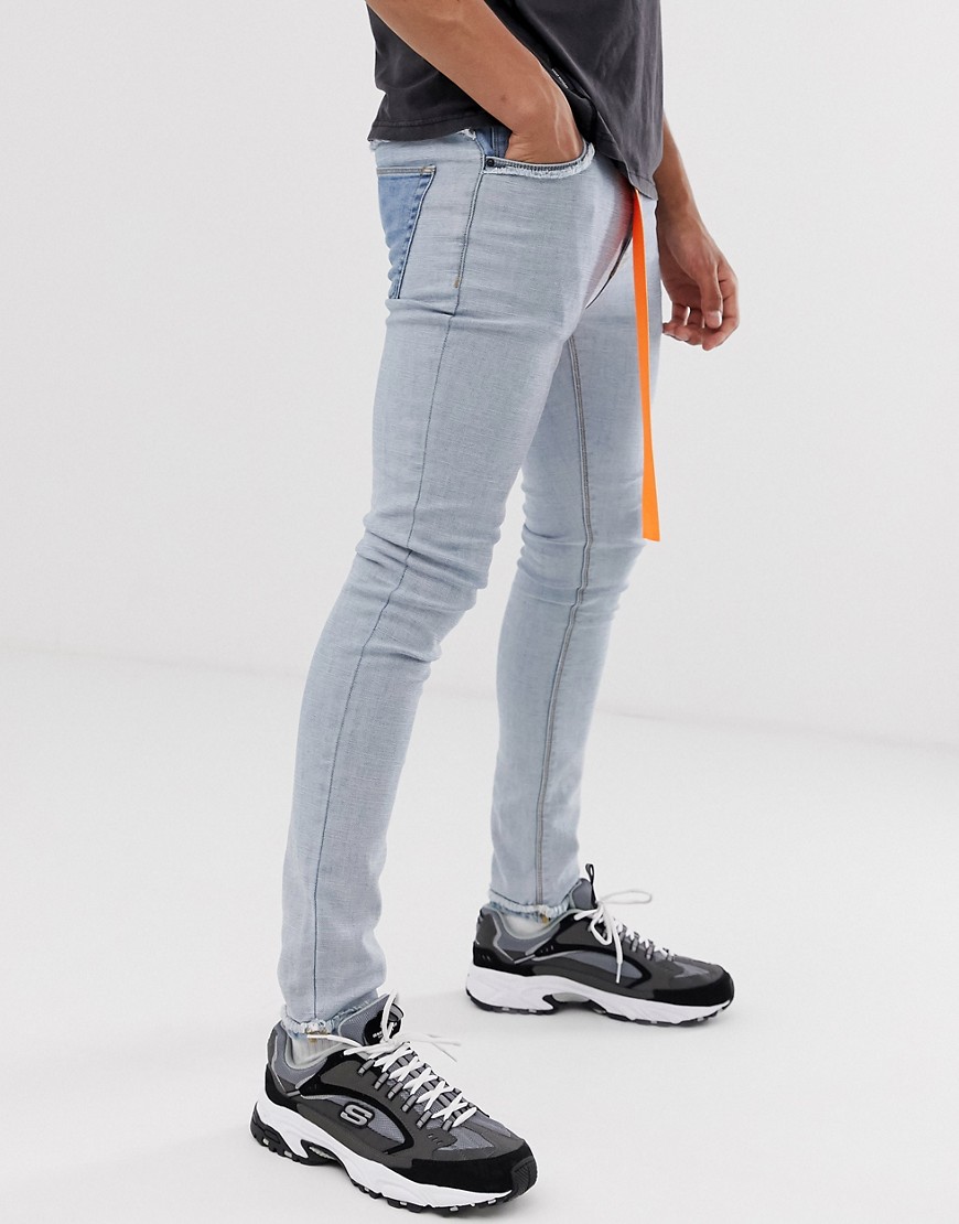ASOS DESIGN - Jeans super skinny blu lavaggio medio effetto al rovescio