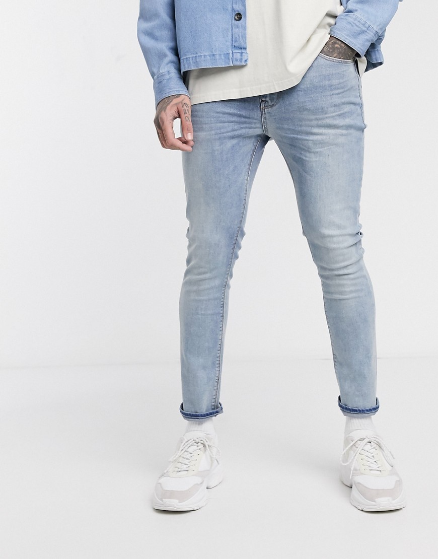 ASOS DESIGN - Jeans super skinny corti lavaggio blu chiaro