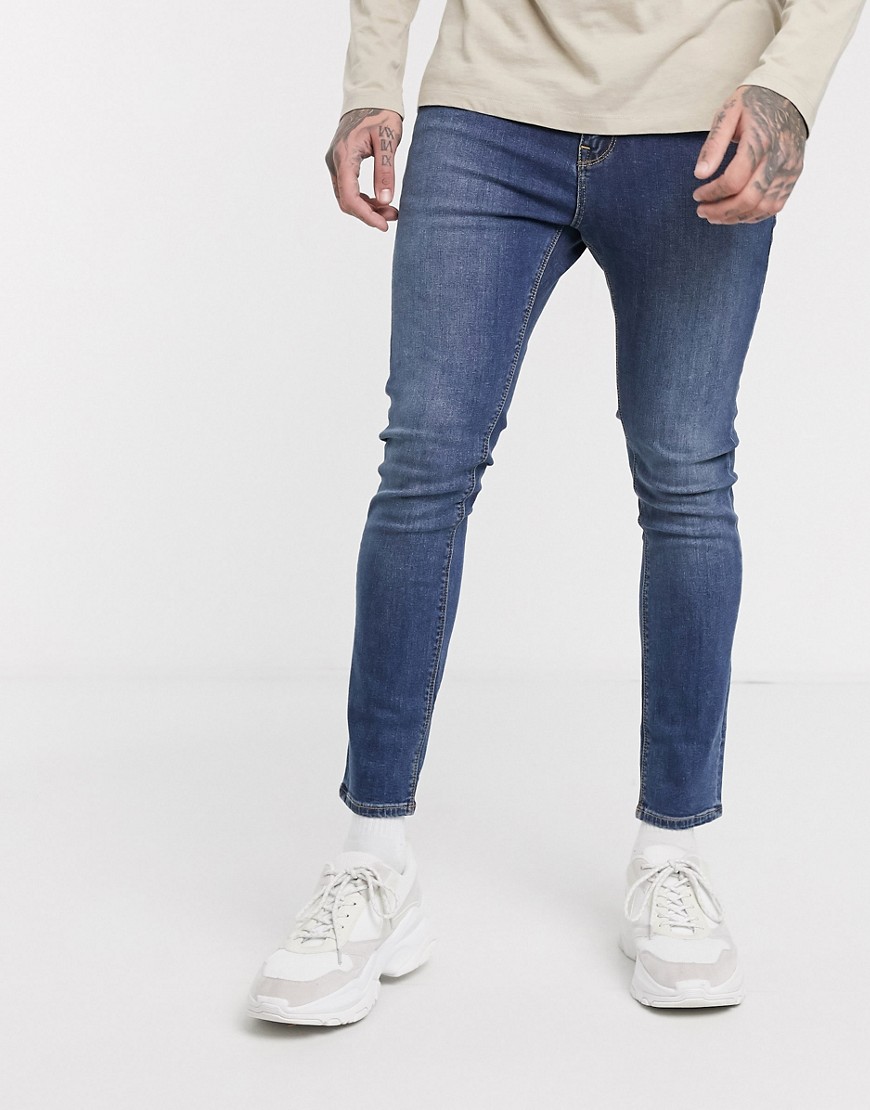 ASOS DESIGN - Jeans super skinny corti lavaggio blu medio