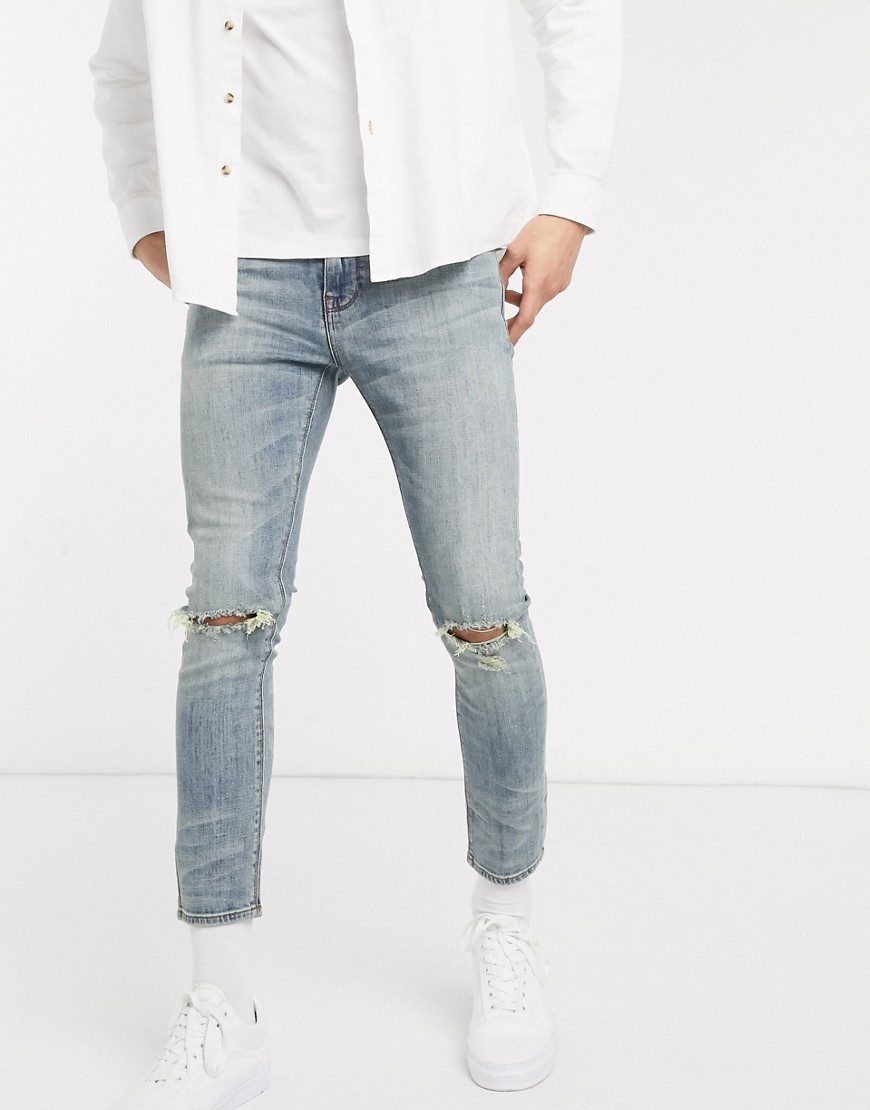 ASOS DESIGN - Jeans super skinny corti lavaggio medio vintage con ginocchia strappate-Blu