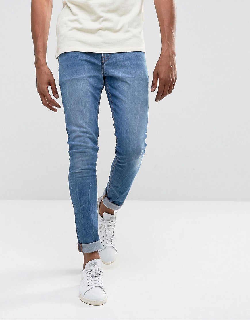 ASOS DESIGN - Jeans super skinny da 12,5 once blu medio slavato