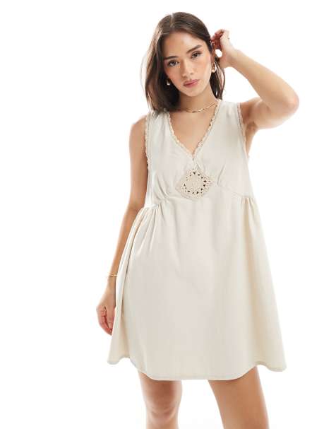 ASOS DESIGN denim mini dress with crochet insert in neutral wash