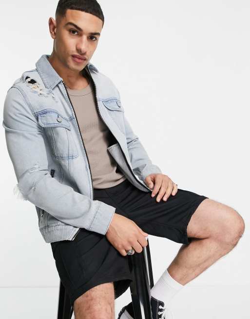 ASOS DESIGN – Jeansowa zapinana na zamek kurtka oversize z przetarciami