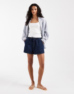 ASOS DESIGN - Jeansshorts zum Hineinschlüpfen in Rinse-Waschung-Marineblau