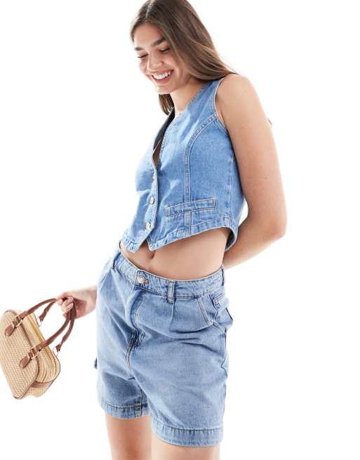 ASOS DESIGN – Jeansweste im Western-Stil in Mittelblau
