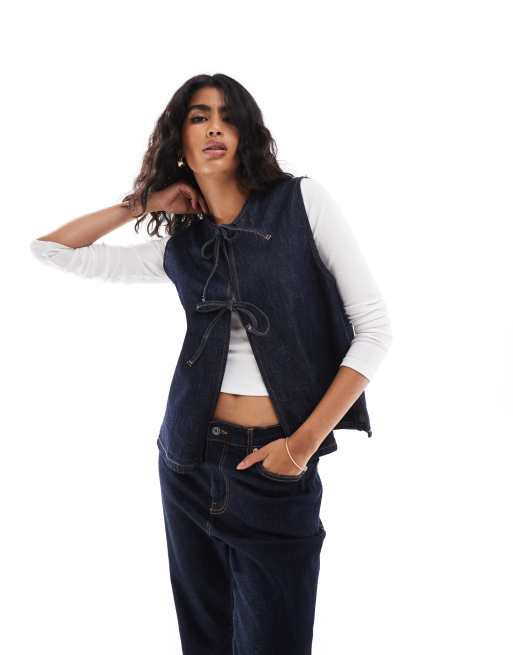 ASOS DESIGN – Jeansweste in Indigoblau mit Bindebändern
