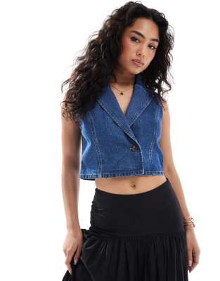 ASOS DESIGN - Jeansweste in mittelblauer Waschung