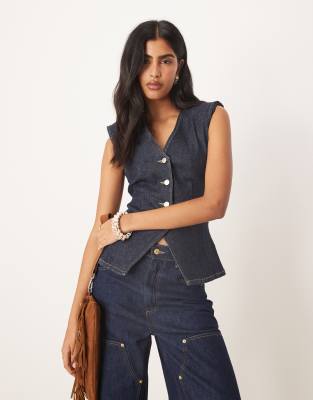 ASOS DESIGN - Jeansweste in Rinse-Waschung mit betonter Taille und Schulterpolstern-Marineblau