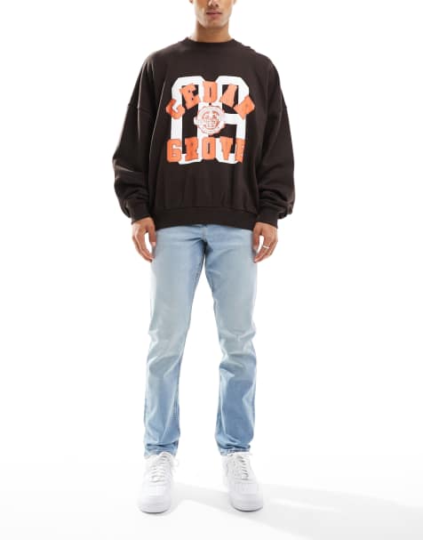 ASOS DESIGN jeansy o dopasowanym kroju w lekko spranym, niebieskim kolorze - view 1