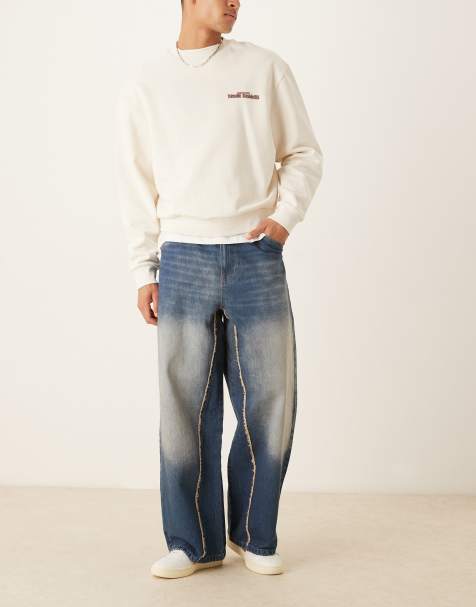 ASOS DESIGN – Jeansy super baggy z surowym wykończeniem w spranym kolorze indygo - view 1