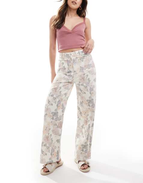 ASOS DESIGN – Jeansy w kwiaty z szerokimi nogawkami do kostek i kieszeniami z przodu - view 1