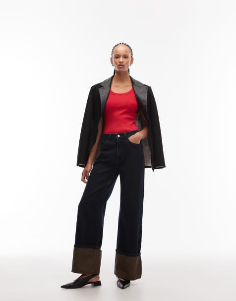 ASOS DESIGN – Jeansy z szerokimi, mocno podwiniętymi nogawkami w kolorze indygo z brązowym przebarwieniem - view 1