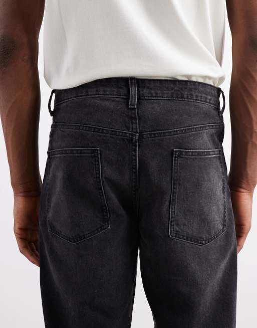 ASOS DESIGN – Jeansy ze zwężanymi nogawkami w spranym czarnym kolorze, 4 z 5
