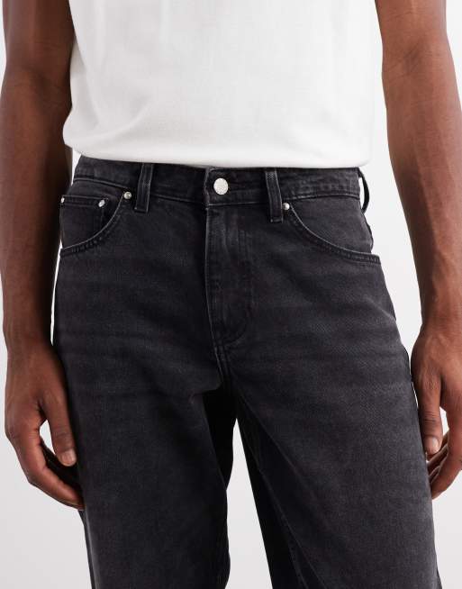 ASOS DESIGN – Jeansy ze zwężanymi nogawkami w spranym czarnym kolorze, 5 z 5