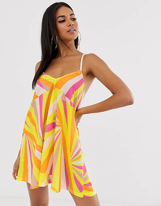 ASOS DESIGN jersey beach sundress with rope tie in faded fluro stripe ...