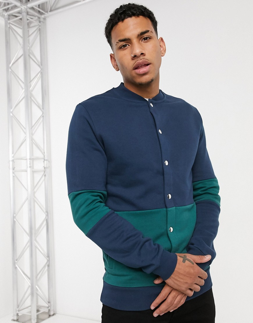 ASOS DESIGN jersey bomber jacket in navy and green color-blocking with snaps