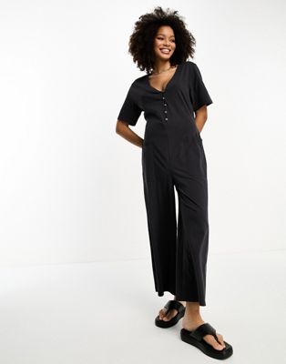 ASOS DESIGN jersey button front chuck on jumpsuit in washed black