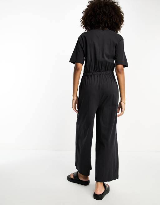 ASOS DESIGN jersey overalls in black with side stripe