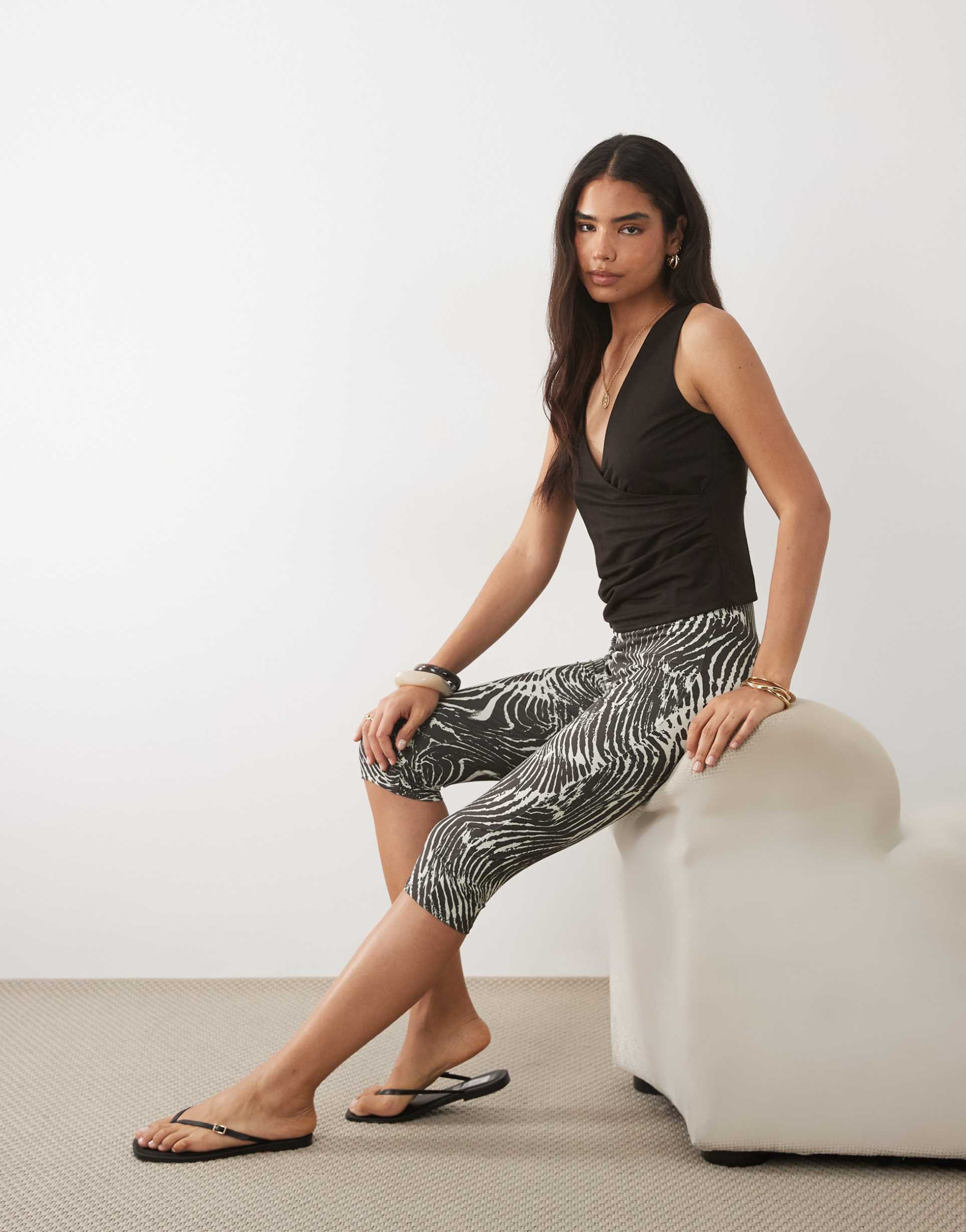 asos design jersey capri leggings in zebra print