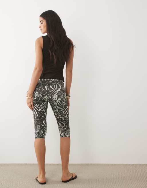 ASOS DESIGN jersey capri leggings in zebra print, 5 of 5
