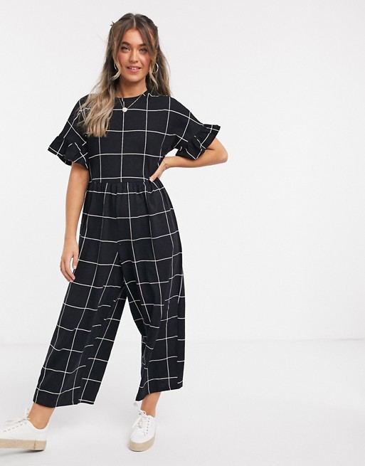 ASOS DESIGN lounge jersey frill sleeve smock jumpsuit in mono check print