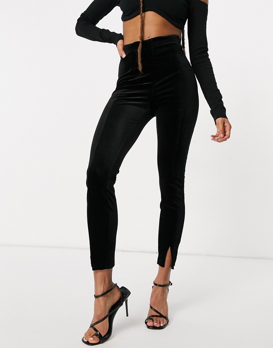 ASOS DESIGN - Jersey pantalon met split aan de voorkant van zwart fluweel