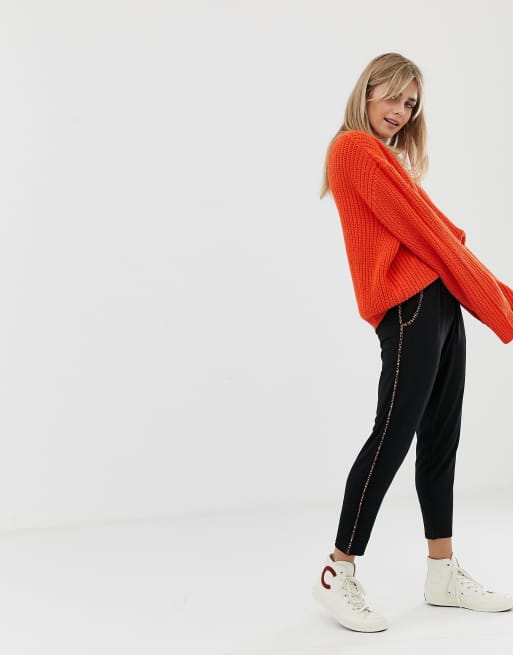 ASOS DESIGN jersey peg trousers with animal print contrast bind