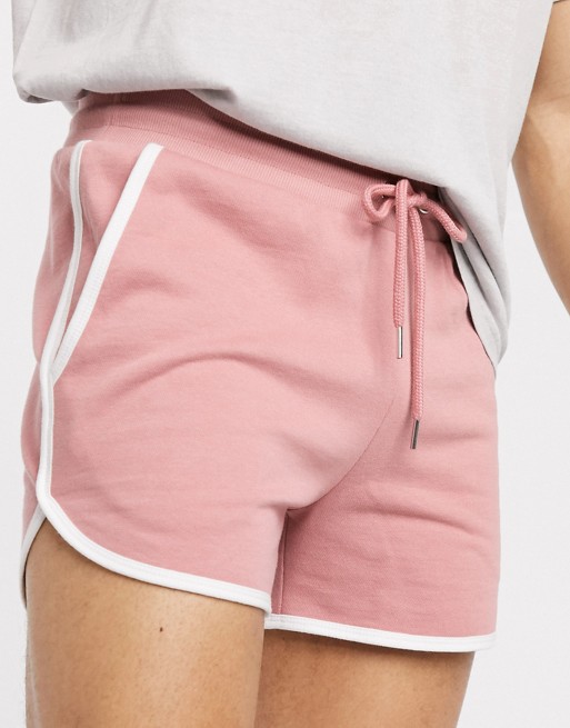 ASOS DESIGN jersey runner shorts in pink with white binding