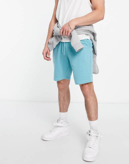 ASOS DESIGN jersey shorts in teal blue
