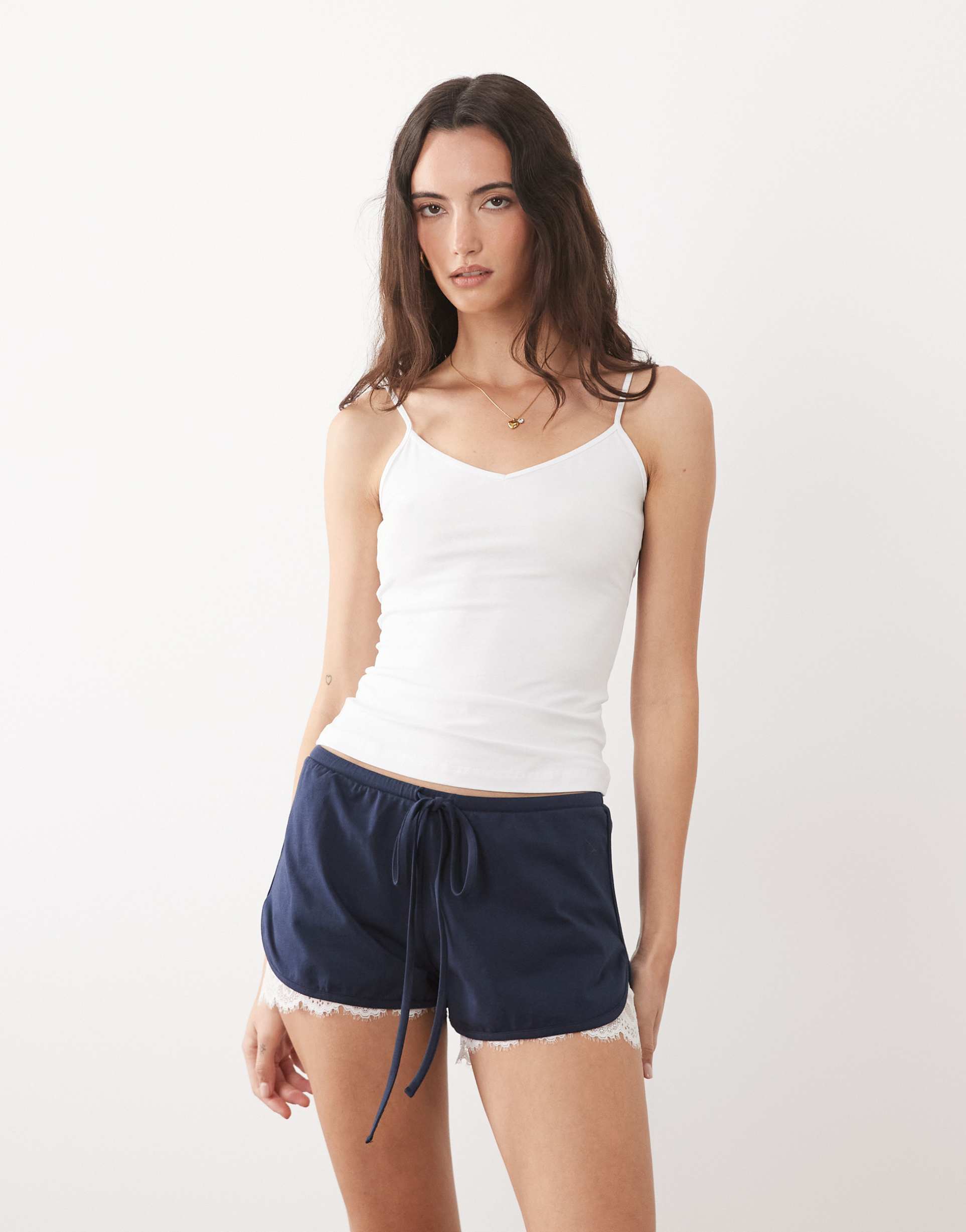 asos design jersey shorts with lace under layer in navy