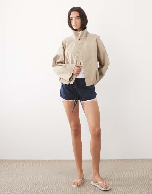 ASOS DESIGN jersey shorts with lace under layer in navy, 3 of 5