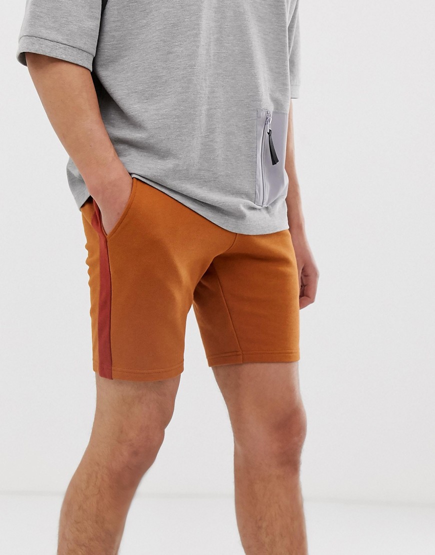 ASOS DESIGN - Jersey skinny short met zijstreep in donkeroranje
