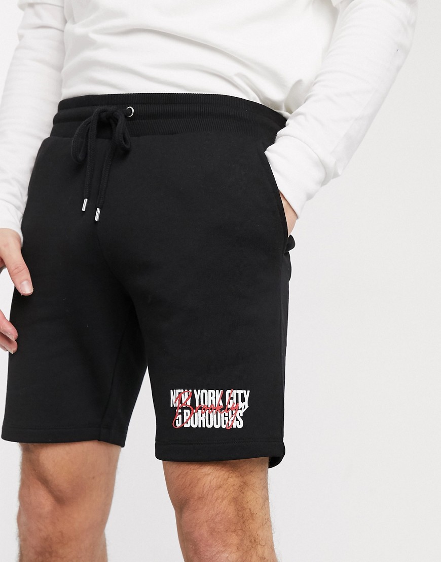 ASOS DESIGN jersey skinny shorts in black with NYC print