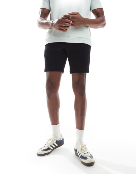 ASOS DESIGN jersey skinny shorts in black - view 1