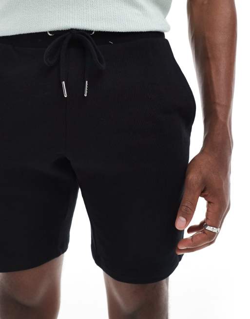 ASOS DESIGN jersey skinny shorts in black
